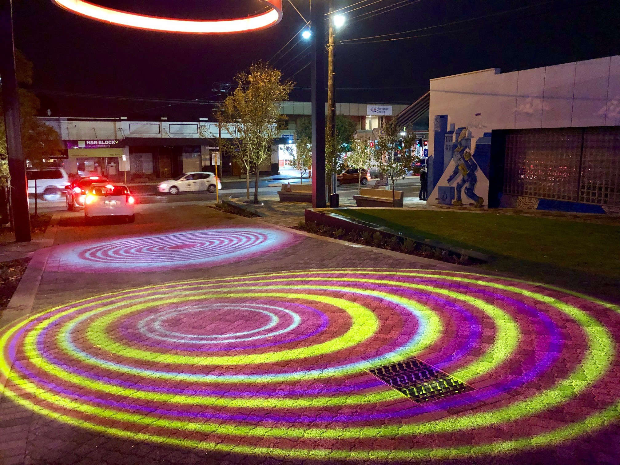Twilight rings at the DENMAC North Perth Common Piazza