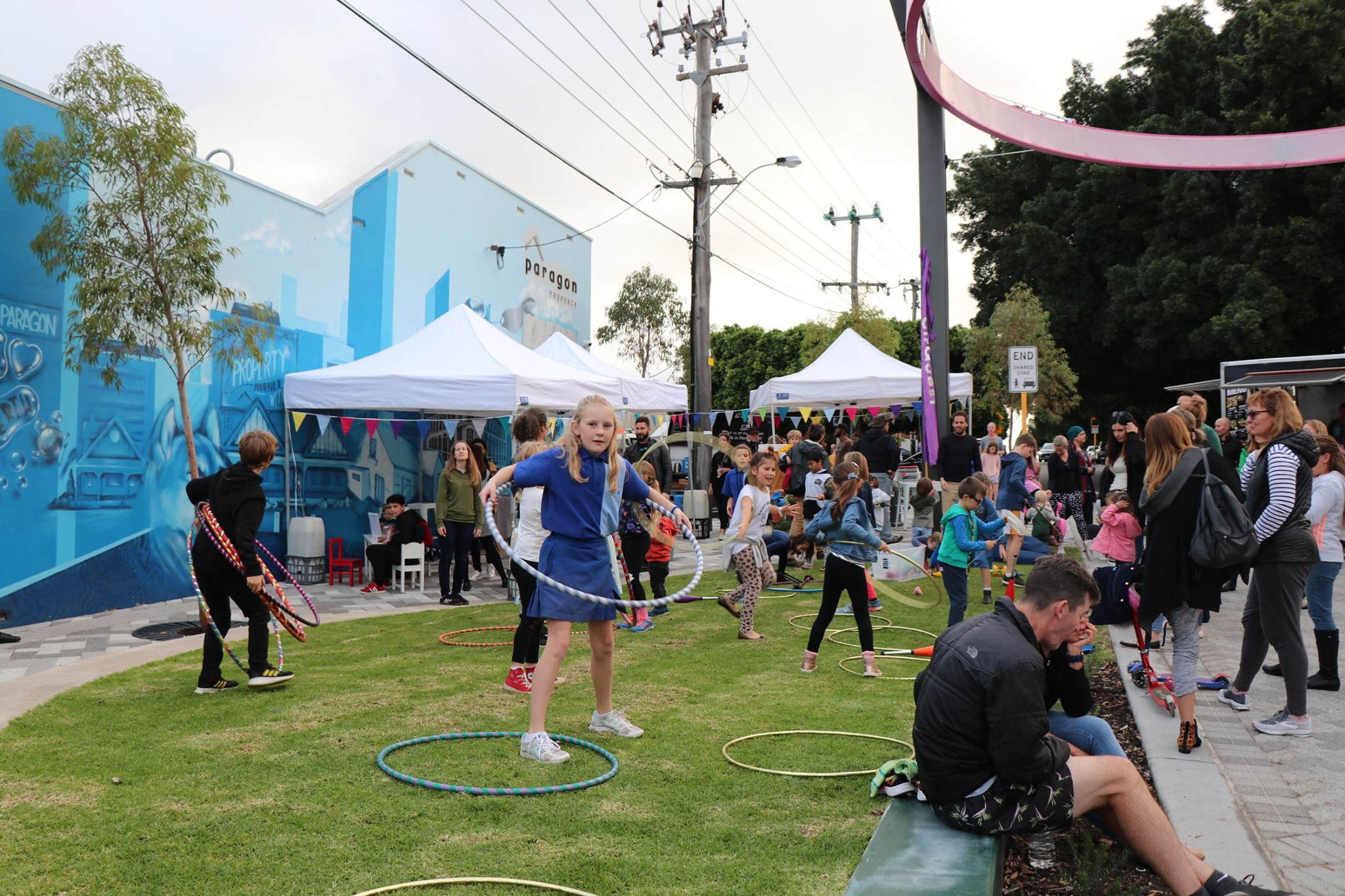 Kids playing at the launch of the North Perth Common Piazza